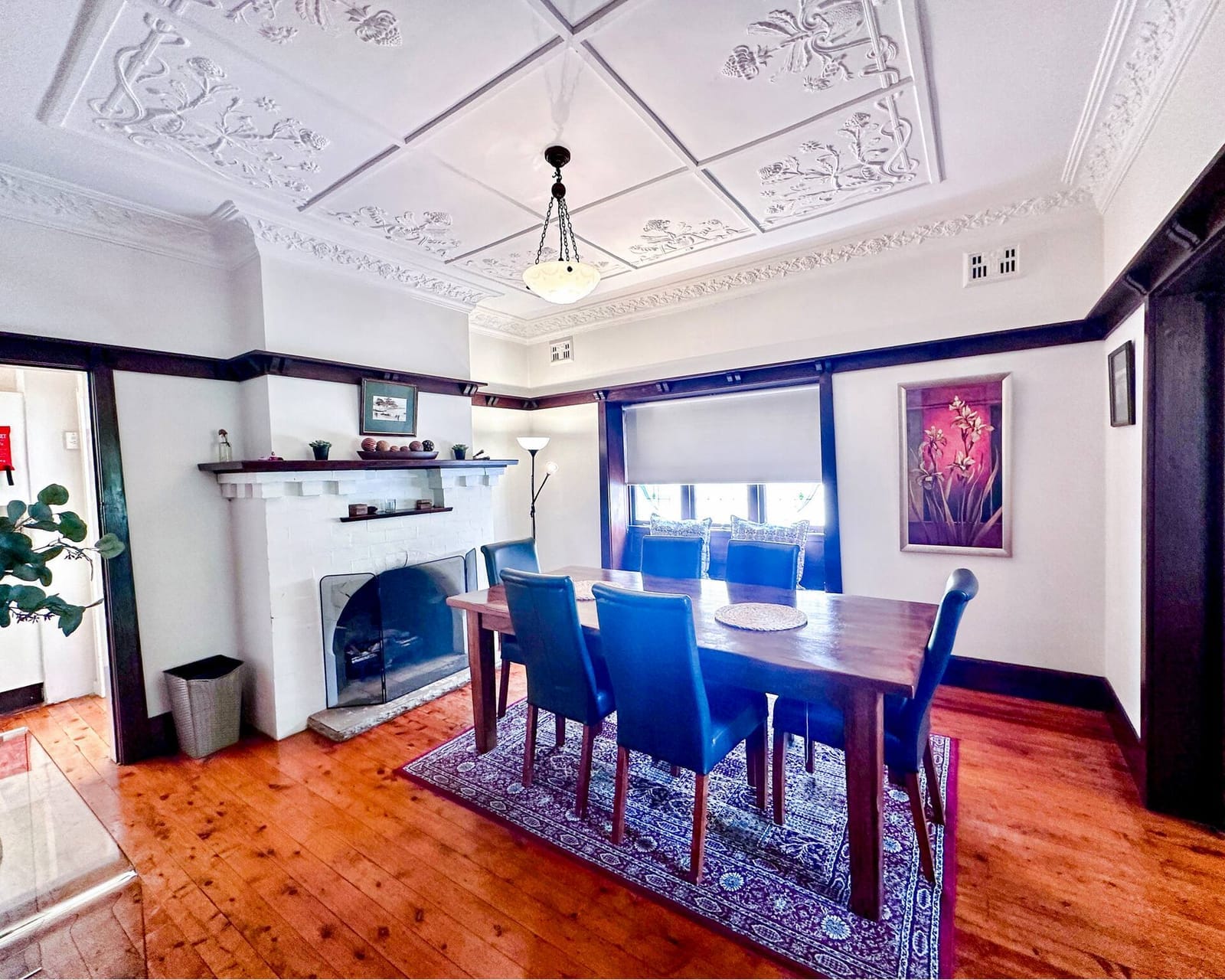 Downstairs dining room, wooden table and a view of the water